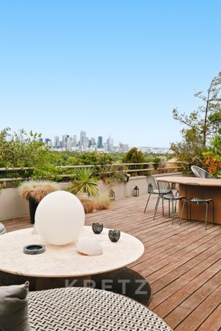 Paris 16ᵉ – Penthouse d’exception avec terrasses panoramiques