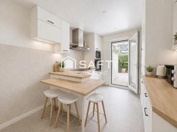 Appartement spacieux avec terrasse, parking et cave au cœur de Bécon