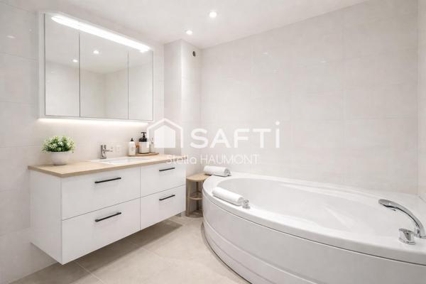 Appartement spacieux avec terrasse, parking et cave au cœur de Bécon