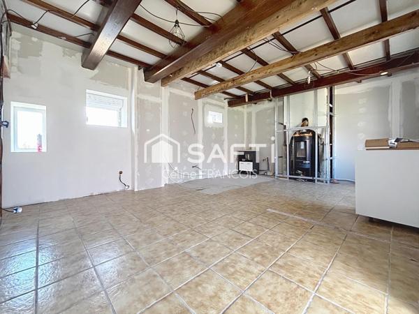 Maison avec travaux à finir, beau potentiel