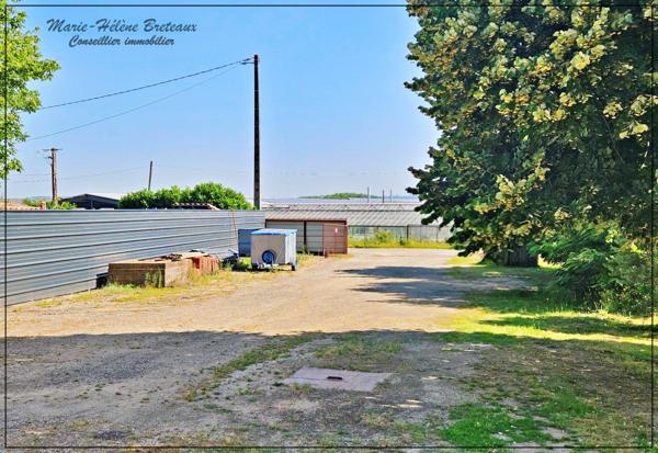 À vendre – Ensemble immobilier avec hangar et maison d’habitation à proximité de la zone O’Green