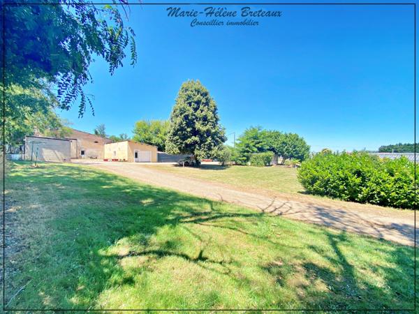 À vendre – Ensemble immobilier avec hangar et maison d’habitation à proximité de la zone O’Green