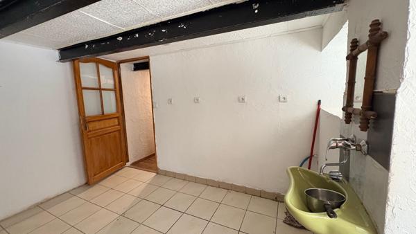Maison mitoyenne sur 3 niveaux
