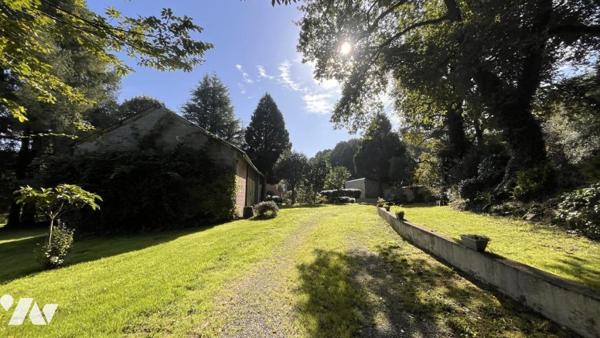 LANGUIDIC : EXCEPTIONNEL: Maison au coeur d'un parc arboré