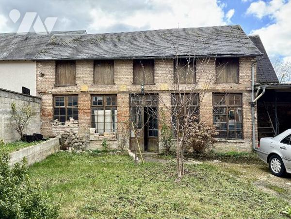 Ensemble immobilier avec garage et atelier