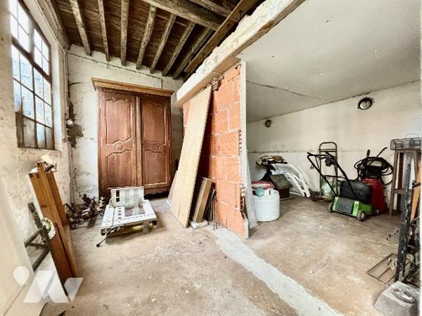 Ensemble immobilier avec garage et atelier
