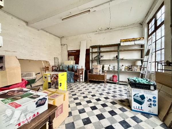 Ensemble immobilier avec garage et atelier