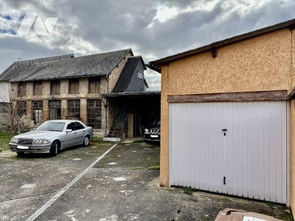 Ensemble immobilier avec garage et atelier