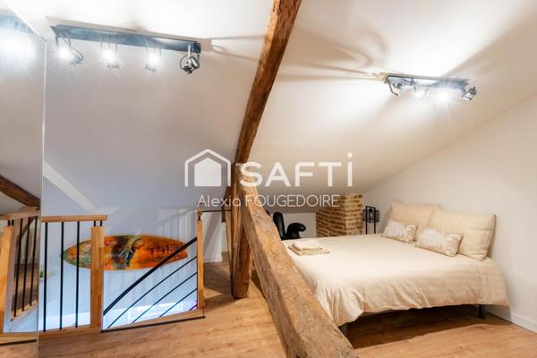 APPARTEMENT ATYPIQUE POUTRE ET PIERRE APPARENTE TYPE 2