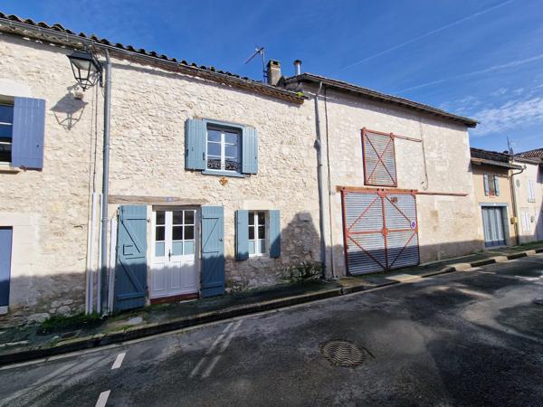 Maison de ville de caractère avec jardin et potentiel d’aménagement