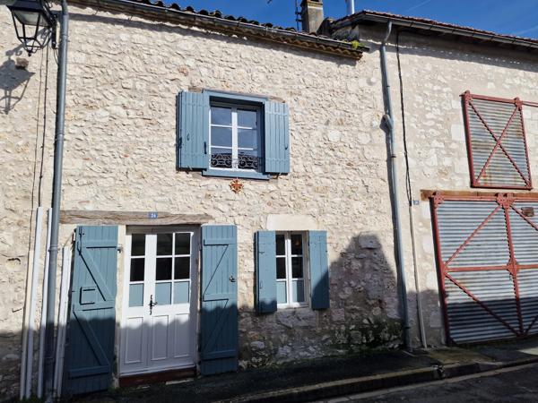Maison de ville de caractère avec jardin et potentiel d’aménagement