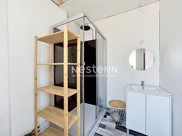 Investissement Place Voltaire - Logement loué + local commercial