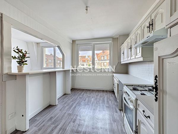Investissement Place Voltaire - Logement loué + local commercial