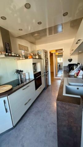 Appartement bois guillaume 100m² 3 chambres dernier étage balcon 4 parkings sans travaux