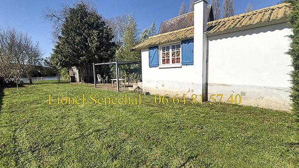 Terrain de loisirs de plus de 500 m2 + un chalet de loisirs en dur de 24 m2  avec un accès direct à la rivière