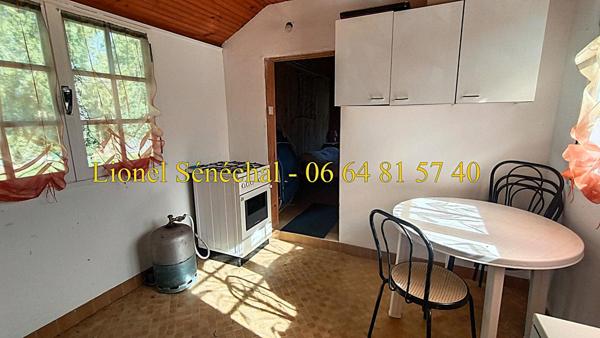 Terrain de loisirs de plus de 500 m2 + un chalet de loisirs en dur de 24 m2  avec un accès direct à la rivière