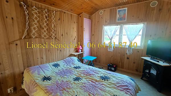 Terrain de loisirs de plus de 500 m2 + un chalet de loisirs en dur de 24 m2  avec un accès direct à la rivière