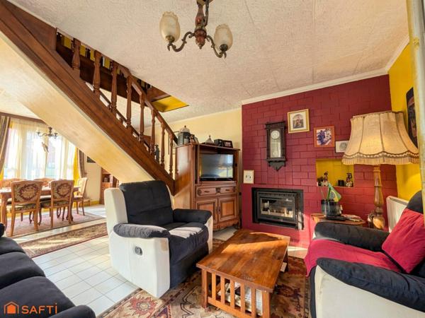 Quartier prisé, proche centre-ville, jardin, garage, sous-sol.