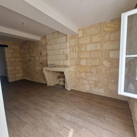 Immeuble de commerce et 2 appartements