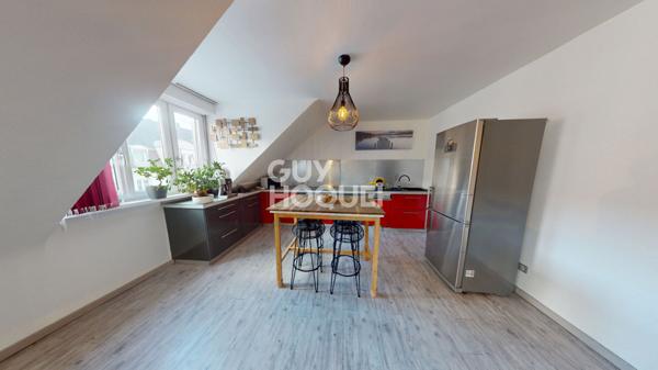 Appartement 3 pièces de 64 m² au Dernier étage et au Centre-ville de Mulhouse