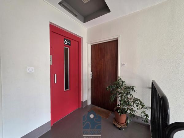 Appartement 4 pièces avec balcon, cave et stationnement couvert sécurisé