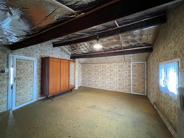 A vendre Maison d'environ 82m² 2 chambres, véranda, 40m² combles aménageables et garage