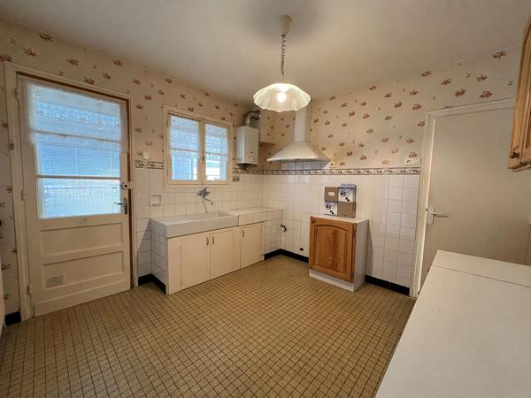 A vendre Maison d'environ 82m² 2 chambres, véranda, 40m² combles aménageables et garage
