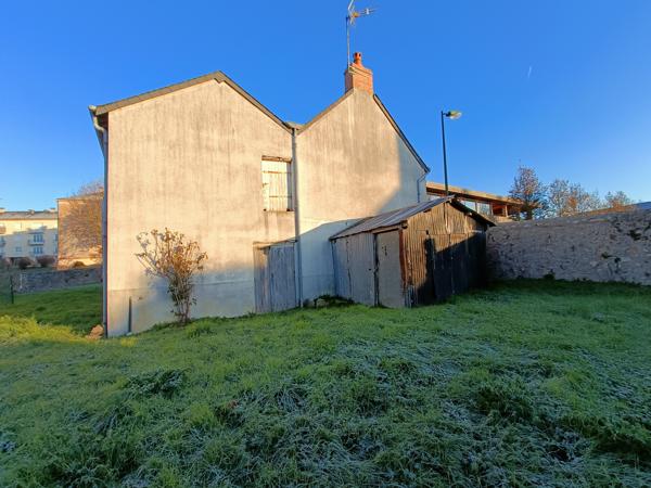 Immeuble eux logements avec terrain