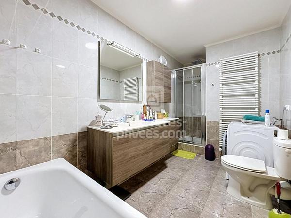 Appartement 4 pièces de 100 m² avec ascenseur, garage et loggia