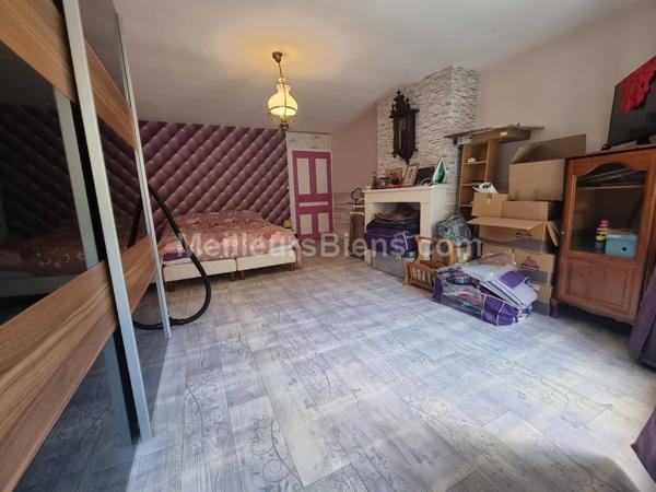 Maison mitoyenne rénovée avec véranda et jardin