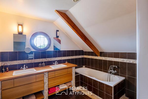 Villa d’architecte bois et brique dans un écrin de nature préservé à Soisy sous Montmorency