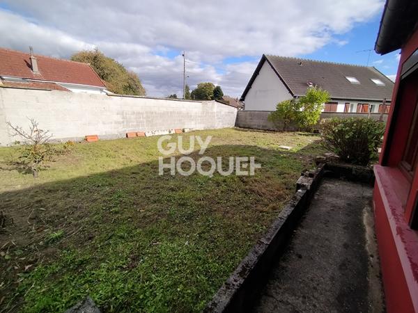 Maison de plain-pied à vendre à PÉRONNE (80200) avec garage et véranda.