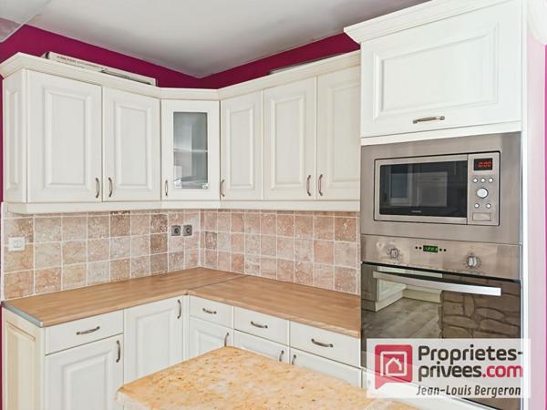 Maison de caractère avec bois et caves troglodytes