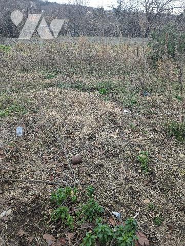 SAINT MAURICE L EXIL parcelle de terrain viabilisée de 400 m2  , située dans une impasse.