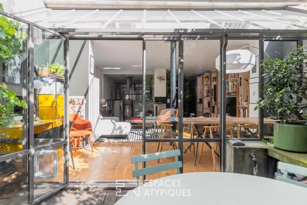 Loft contemporain avec véranda et jardin