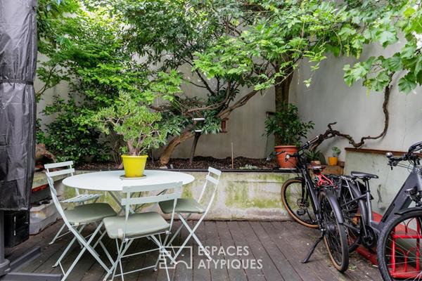 Loft contemporain avec véranda et jardin