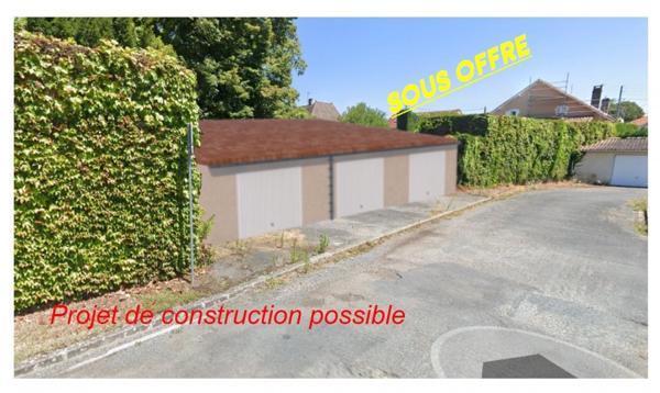 Terrain en hyper centre avec P.C accordé pour construire 3 garages de plus de 25m2 chacun