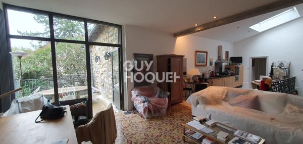 Maison d'exception avec garages, cave, local indépendant et parc arboré