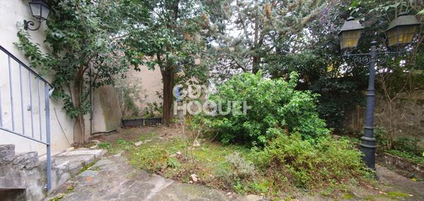 Maison d'exception avec garages, cave, local indépendant et parc arboré