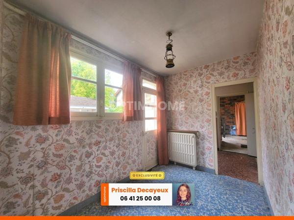 Ensemble immobilier à rénover - 2 maisons individuelles - terrain - 82 000€