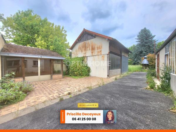 Ensemble immobilier à rénover - 2 maisons individuelles - terrain - 82 000€