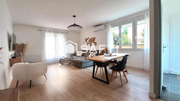 Maison de ville de plain pied rénovée avec jardin - 3 chambres, 2 stationnements.