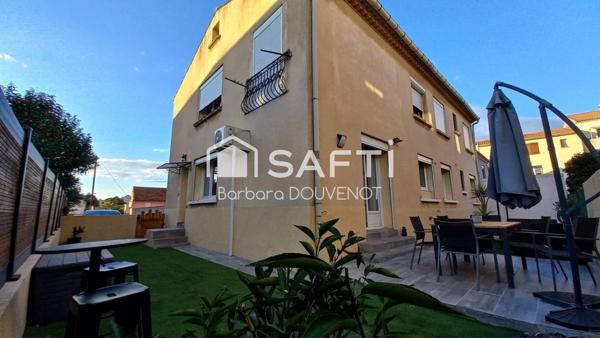 Maison de ville de plain pied rénovée avec jardin - 3 chambres, 2 stationnements.