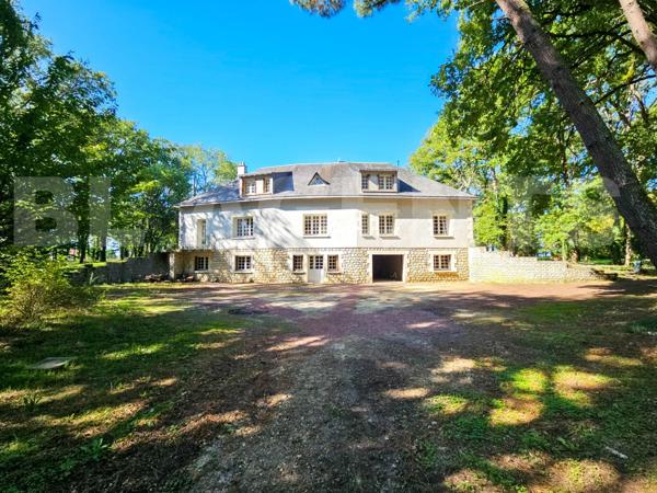 Maison traditionnelle avec dépendances et vaste terrain