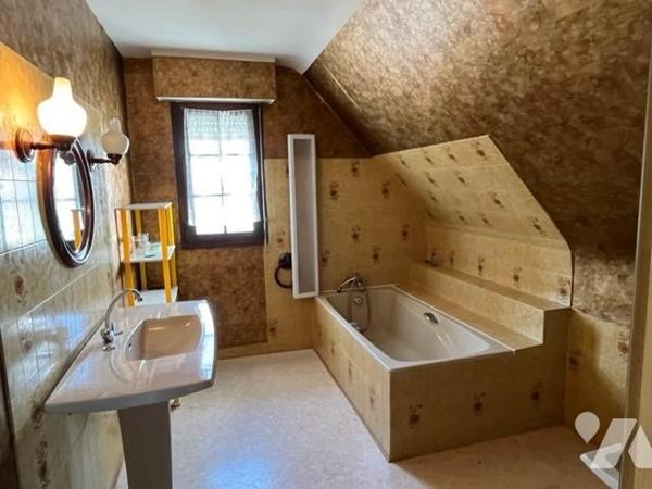 Maison non mitoyenne sur sous sol 