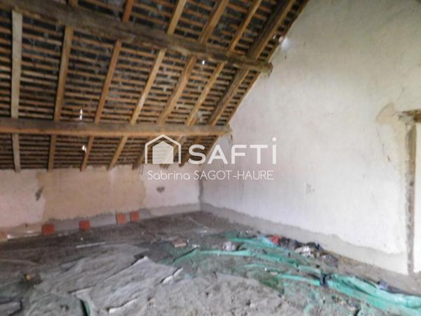 Longère sur parc de 2460m2 avec grange et garage