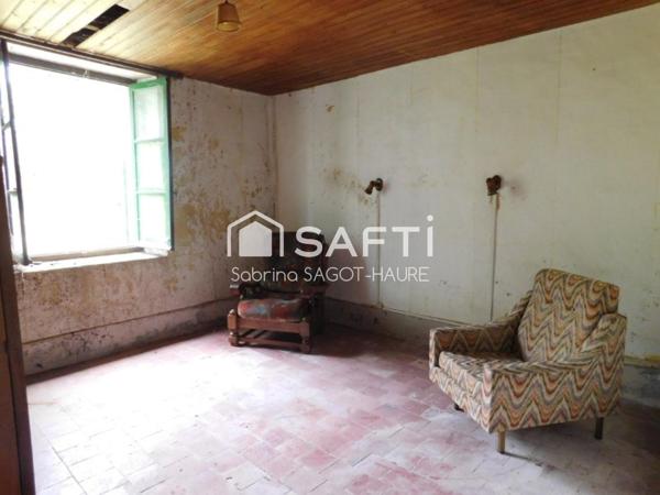 Longère sur parc de 2460m2 avec grange et garage