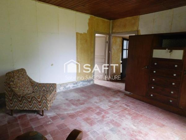 Longère sur parc de 2460m2 avec grange et garage