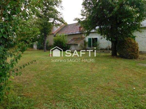 Longère sur parc de 2460m2 avec grange et garage