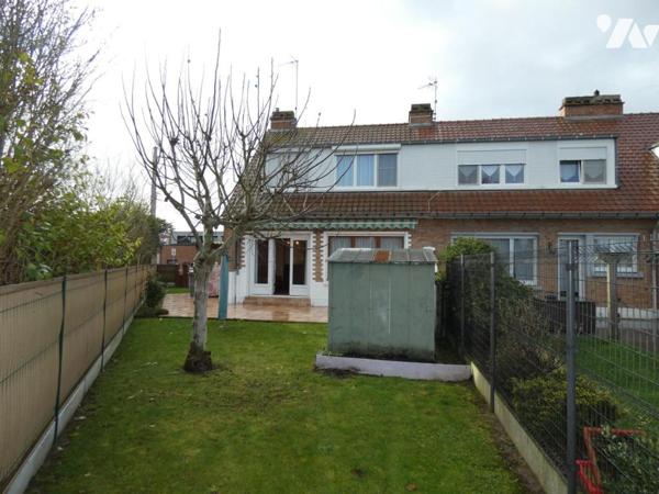 Comines , proche du centre ville , belle maison semi individuelle  trois chambres jardin et garage